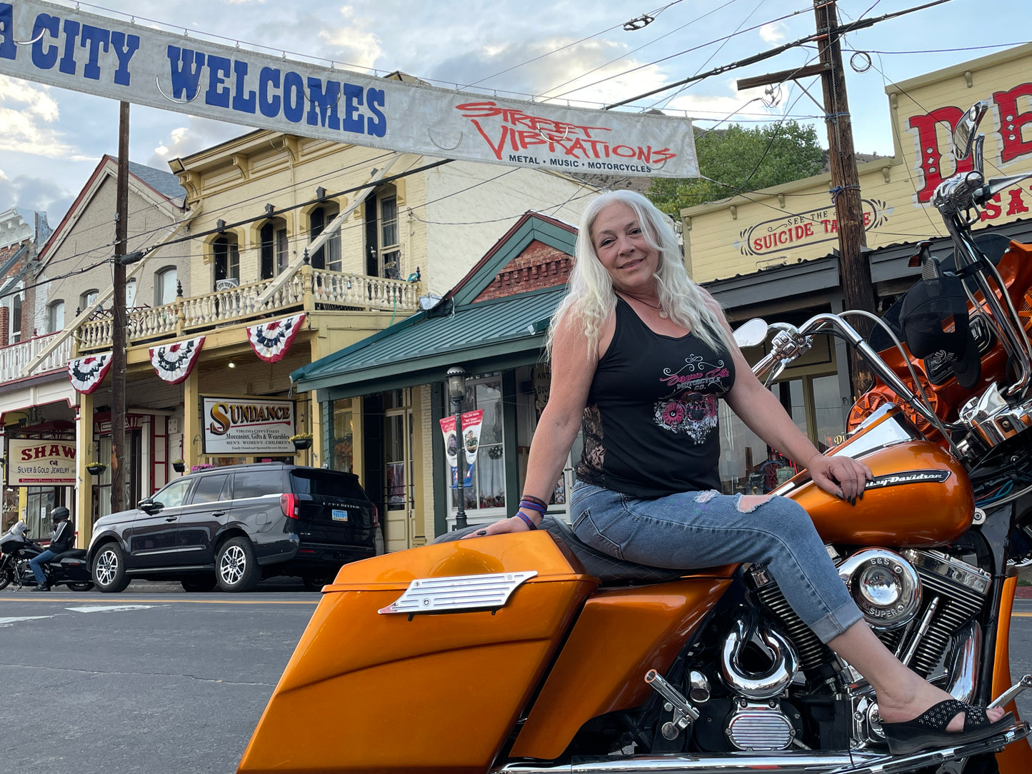 Owner, Cheryl, wearing the lace back tank top at Street Vibrations 2025