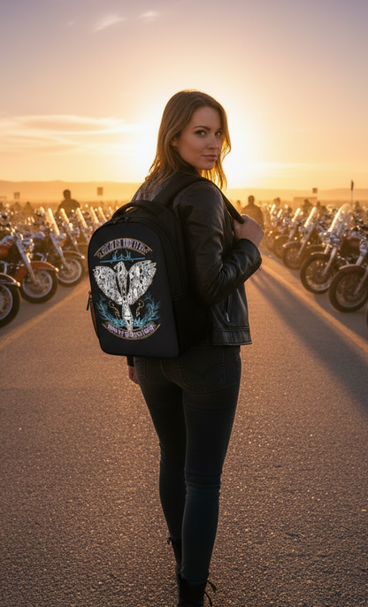 Back Lifestyle view of the "I Tell My Evil Where to Fly" black biker backpack featuring the VCMCo. eagle skull graphic — motorcycle lifestyle accessory by Virginia City Motorcycle Company