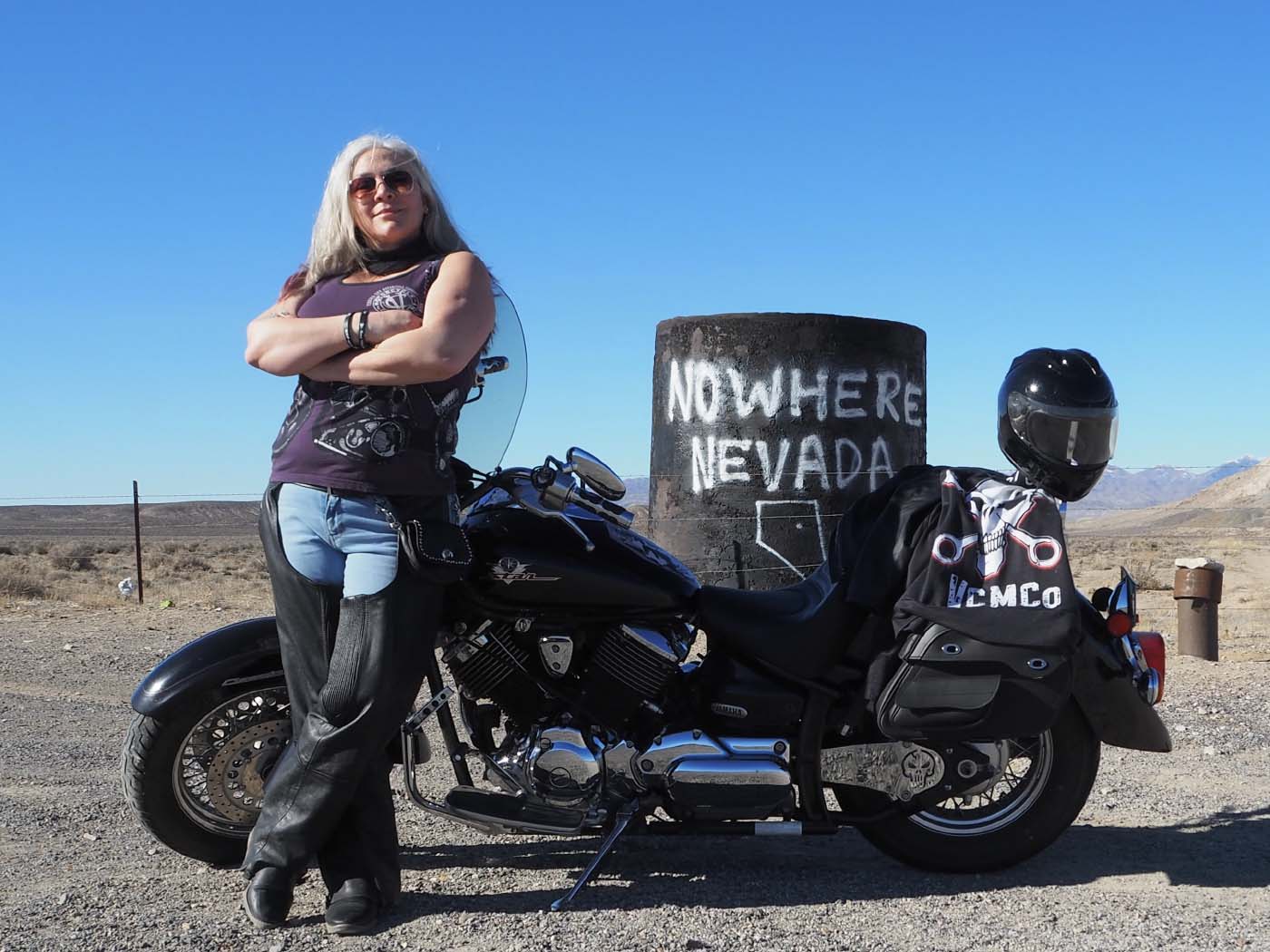 Women with Motorcycle in Nowhere Nevada. Virginia City Motorcycle Company