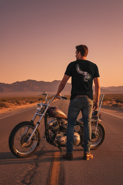 VCMC Men's Black Tee Lifestyle image with a man on a long stretch of road and a custom motorcycle